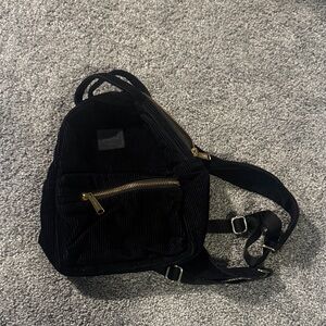 Herschel Supply Company Black Corduroy Mini Sling Backpack with Gold Zippers